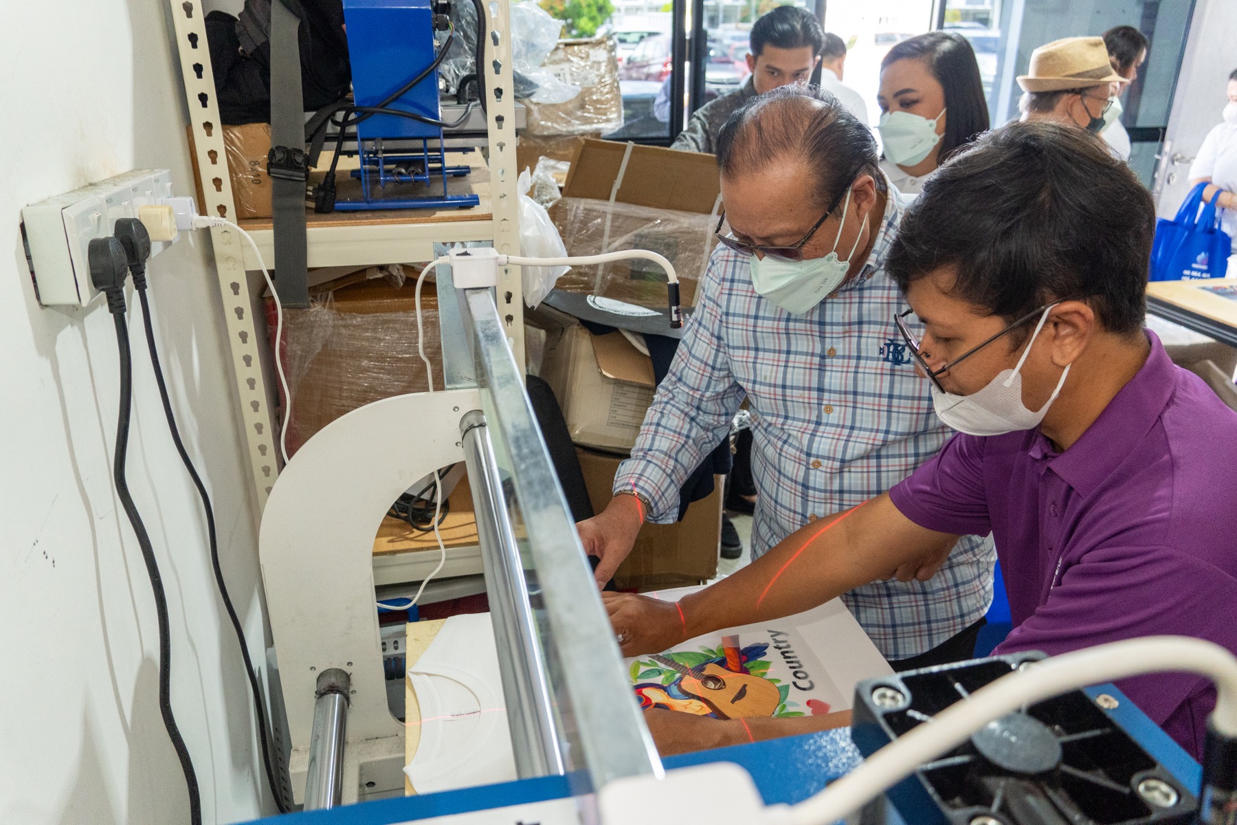 SME Corp representatives viewing the Creativenest production process